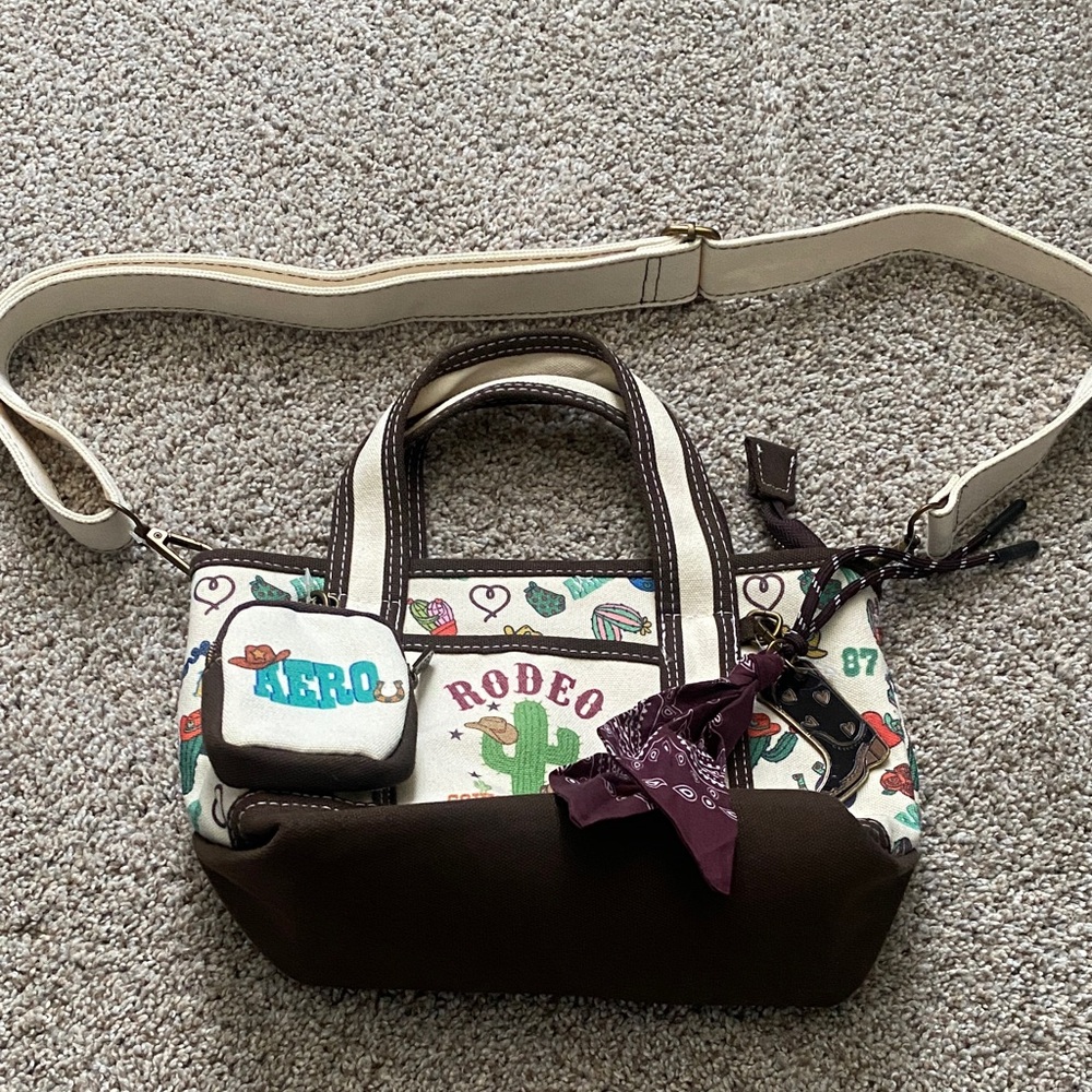Rodeo Printed Canvas and Brown Trim Crossbody Bag